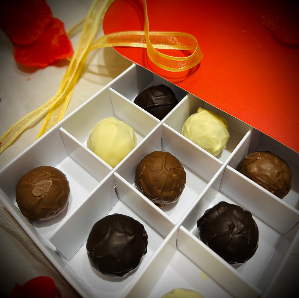 inside the box Red heart-shaped gift box of 9 Lefevre Chocolate artisan Belgian chocolate truffles for Valentine's Day