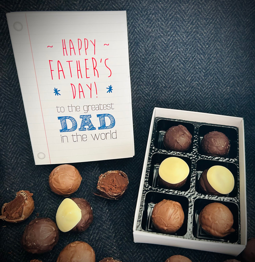 Lefevre Chocolate artisan truffles arranged on a dark background